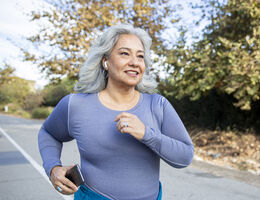 A woman jogging.